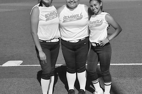 Seminole Lady Chieftains honored three of their seniors before their softball game Thursday. Pictured is Audriona Wassana, Elsie McGirt and Ava Yarbrough. Staff Photo by Bill Anderson