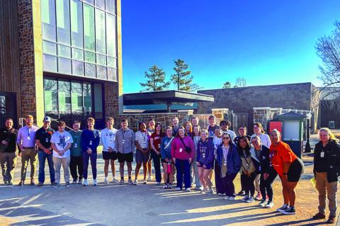 Above left, Seminole State College freshman Alivia Wapskineh, 2025 Miss Seminole Nation, stands in front of the Indian Princesses exhibit at the Oklahoma History Center during the 2026 George and Donna Nigh Leadership Academy in Oklahoma City. Right, Part
