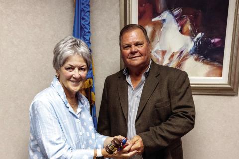 Above: Barry Tims (left) and Mona Adkisson (right) were sworn in at the July 17 meeting of the SSC Board of Regents. Former District Judge George Butner (center) administered the Oath of Office. Left, Regent Curtis Morgan (right), who served as Chair of t