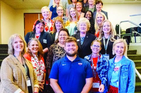Above left, SSC President Lana Reynolds congratulates OACC honorees—Professional Staff Member of the Year Alecia Bailey, Faculty Member of the Year Dr. Deanna Miles and Support Staff Member of the Year Alisha Riojas—for their achievements at the Okla.