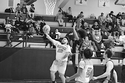 Strother Yellowjacket Braydon Turner flies in for the shot against Carney Tuesday. Staff Photo by Andy Wilson