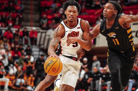 OSU Cowboy Anthony Roy drives to the basket. Courtesy Photo by Ben Schatzel
