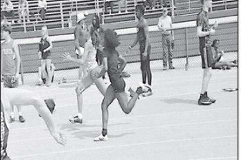 Wewoka Lady Tiger Heavenli Hill places 16th overall in the 100M run with a time of 13.13 Tuesday. Staff Photo by Bill Anderson