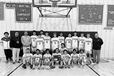 The Sasakwa Vikings win the Graham-Dustin Basketball Tournament Championship this past weekend 63-51 over the Porum Panthers. Courtesy Photo