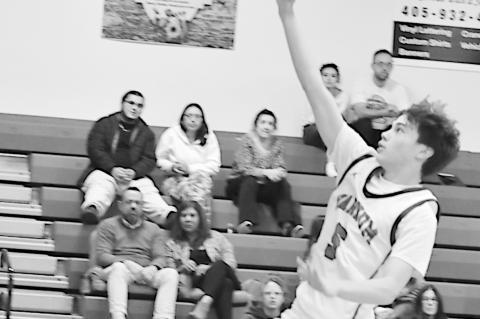Varnum Whippet Daison Hadley flies in for the basket Tuesday night. Staff Photo by Andy Wilson