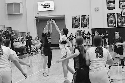 Seminole Lady Chieftain Aundrea Tagg takes the shot from three-point range Saturday night. Staff Photo by Bill Anderson