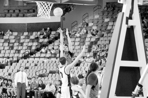 Left, Varnum’s Evans Wise battles a Calumet defender for a bucket Friday afternoon in the OG&amp;E Coliseum. Below, Isaac Wind looks for two. Bottom photo: A Varnum player gets off a shot in Friday’s game. (Staff photos by Andy Wilson).