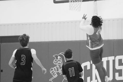 Varnum Whippet Jon Madkins goes in for the layup against Hennessey Saturday. Courtesy Photo by Jeanne Gosa
