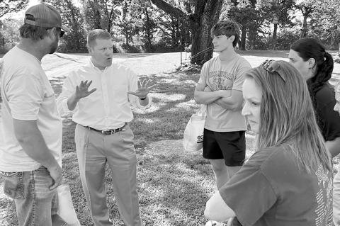 Mike Sanders with the Granstaff family. (Photo provided)