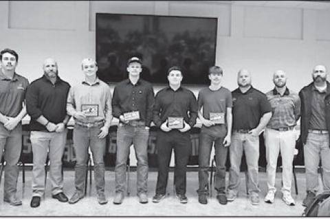 The Konawa Tigers finished the 2025 season as Class A Division II District Champions. Pictured is the Konawa football seniors with coaches. Head coach Jeff Tompkins was awarded the All District Coach of the Year. Courtesy Photo