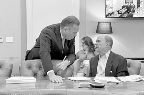 Oklahoma Treasurer Todd Russ, left, talks to board member John Waldo before a meeting of the Tobacco Settlement Endowment Trust Board of Investors at the Capitol in Oklahoma City on Wednesday, Feb. 18, 2026. (Paul Monies/Oklahoma Watch)