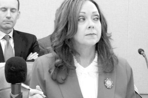 State Auditor and Inspector Cindy Byrd reviews numbers during a recent meeting of the Board of Equalization at the Capitol. (Photo by Barbara Hoberock/Oklahoma Voice)