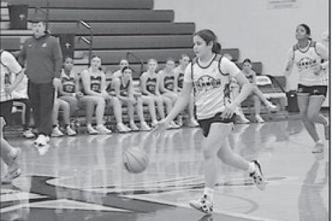 Varnum Lady Whippet Jenna Lofton drives the ball to the basket Monday morning. Staff Photo by Bill Anderson