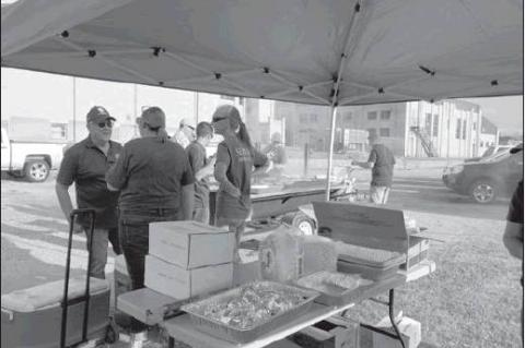 Rotary hold annual hamburger cook out