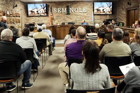 Dozens Pack Library For Downtown Project Hearing
