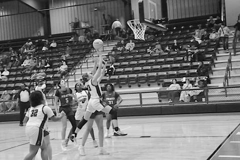Seminole Lady Chieftain Jaxie Satawake fast-breaks to the basket Friday night against Byng. Staff Photo by Bill Anderson
