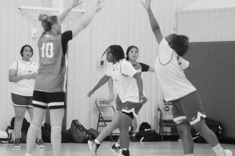 Varnum Lady Whippet Ashlyn White-Richards takes the shot from three-point range. Courtesy Photo by Jeanne Gosa