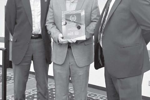 SSC Educational Foundation Vice Chair Mark Schell (left) and Chair Lance Wortham (center) accept the David L. Boren Community Achievement Award presented by Seminole Chamber of Commerce Chairman Rodney Sutterfield (right) at the chamber’s annual banquet on Feb. 6. The award was presented to the foundation in recognition of the economic impact its Brian Crawford Memorial Sports Complex had on the community of Seminole during 2023.