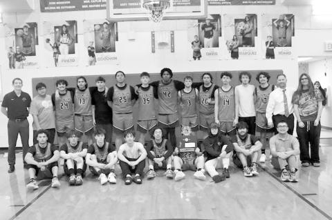 The Varnum Lady Whippets (top photo) and the Varnum Whippets (above) display their hardware designating them as Regional basketball champions. Both teams now moves on to Area at Prague. (Courtesy photos)