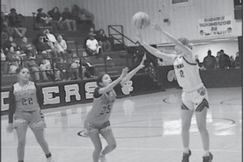 Maud Lady Tiger Aubri Kueneman takes a shot from three-point range Tuesday. Staff Photo by Bill Anderson