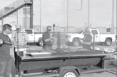 Rotary hold annual hamburger cook out