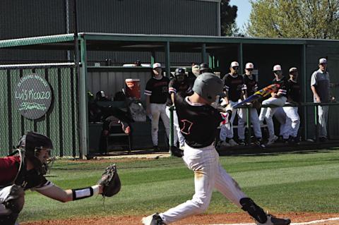 Strother Yellowjacket Peyton Moody knocks the ball into the outfield Thursday. Staff Photo by Bill Anderson