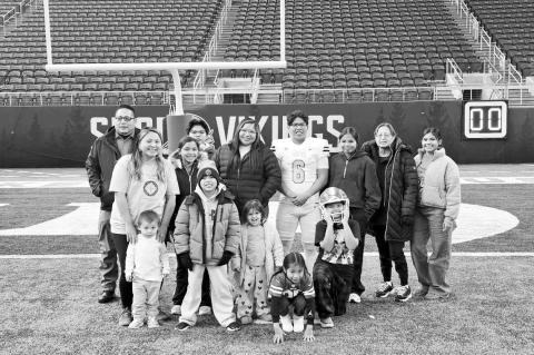 Jaime Lewis with family and friends at U.S. Bank Stadium after the Native All-American Football Game. (Photo provided)