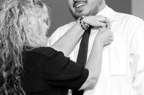 Above left, Oklahoma Baptist University’s 2025 nursing graduates were honored Friday during the Pinning and Lamp-Lighting Ceremony at Immanuel Baptist Church in Shawnee. Right photo: : Dr. Stephanie Parker, chair of the Oklahoma Baptist University Schoo