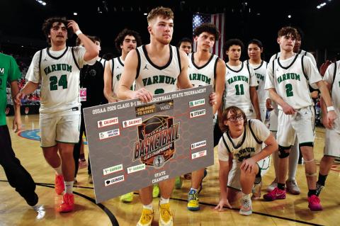 The Varnum Whippet basketball team displays a state championship bracket after defeating Glencoe in the Class B-1 boys quarterfinals Thursday in Oklahoma City. The Whippets advanced to the semifinals, where they were due to face Calumet Friday evening. Th