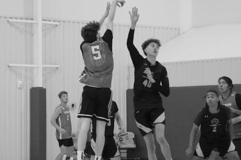 Varnum Whippet Dalson Hadley shoots the ball from the top of the key Saturday. Courtesy Photo by Jeanne Gosa