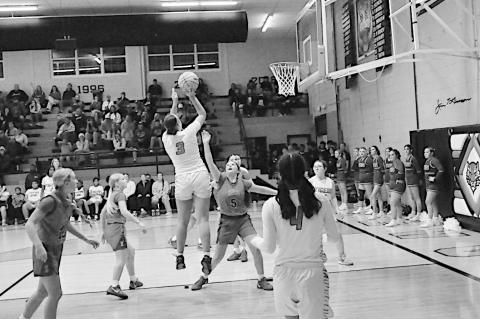 Wewoka Lady Tiger Leilani Scott takes the shot just outside the paint Friday night. Staff Photo by Bill Anderson