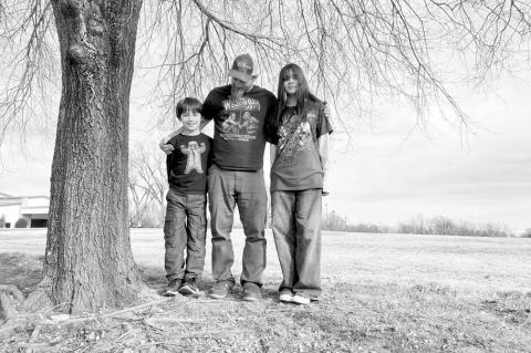 Joe Martin with his children, Joseph, 9, and Aubrey, 15. (Elizabeth Caldwell/ Oklahoma Watch)