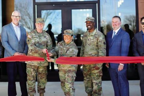 Seminole Natives Brig. Gen. Brad Carter and Col. Lindy White (holding scissors), and Capt. E.J. Johnson, Oklahoma Army National Guard, are joined by Okla. Representative Chris Kannady, Flintco Construction, Larson Design Group, and Oklahoma Army National 