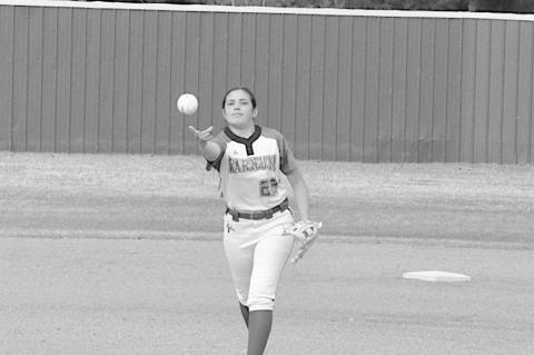 Varnum Lady Whippet Jenna Lofton throws the pitch to Bowlegs batter. Staff Photo by Bill Anderson