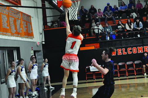Staff Photo by Bill Anderson Strother Yellowjacket Peyton Moody goes in for the layup.