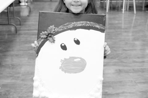 Pictured (l-r) are Serenity Stay, Jackson Stay and Secily Whitlock, the first, second and third place winners, respectively in Monday’s art contest at Snowman Wonderland. The contest was sponsored by local real estate and insurance companies. (Courtesy 