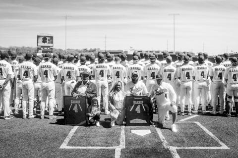 SSC Head Baseball Coach Mack Chambers and members of the Seminole State College baseball team present Denim Harris’ parents, Toy Harper and David Harris, with a framed No. 4 jersey during a jersey retirement ceremony April 4. Harris, an outfielder on th