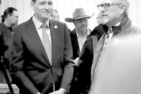 Oklahoma Lt. Gov. Matt Pinnell, left, and Oklahoma CareerTech Skills Centers School System Regional Director Kent Roof, right, talk during the official opening of a new SCSS facility at Northeast Oklahoma Community Corrections Center in Vinita. (Photo pro