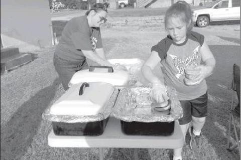 Rotary hold annual hamburger cook out