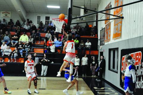 Strother Yellowjacket Peyton Moody flies in for the shot Thursday night. Staff Photo by Bill Anderson