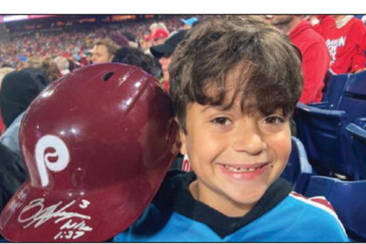 Young Phillies Fan Given Helmet