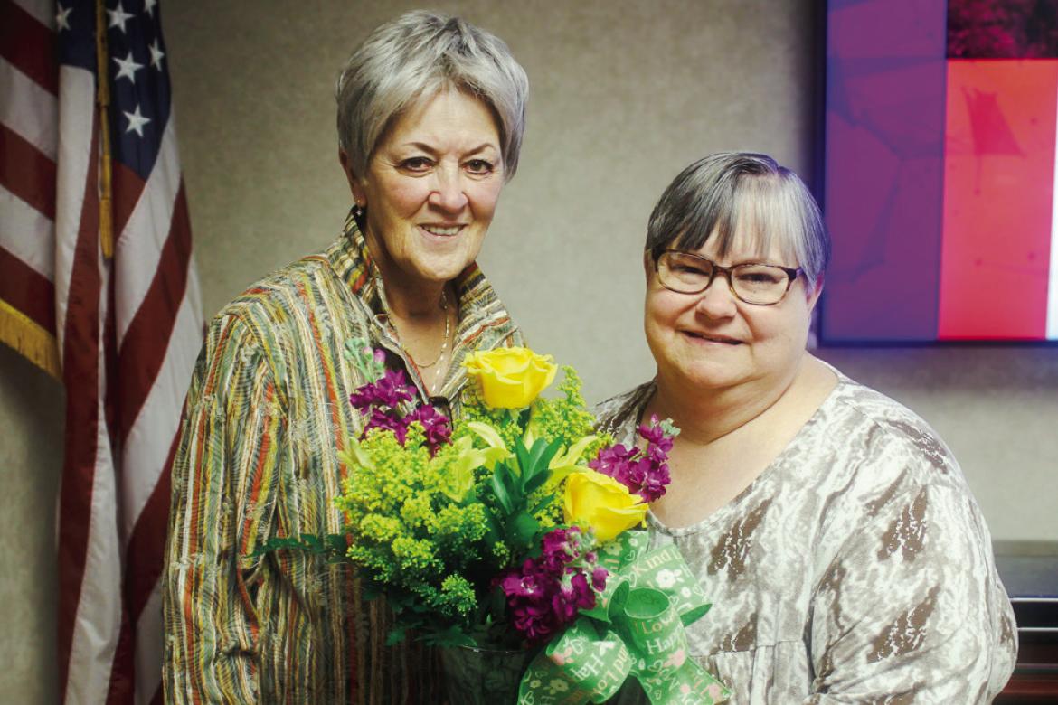 Chair of the SSC Board of Regents Marci Donaho (left) congratulates retired Associate Professor of Sociology Tracy Jacomo on receiving emeritus status following the meeting on March 26. —SSC photo