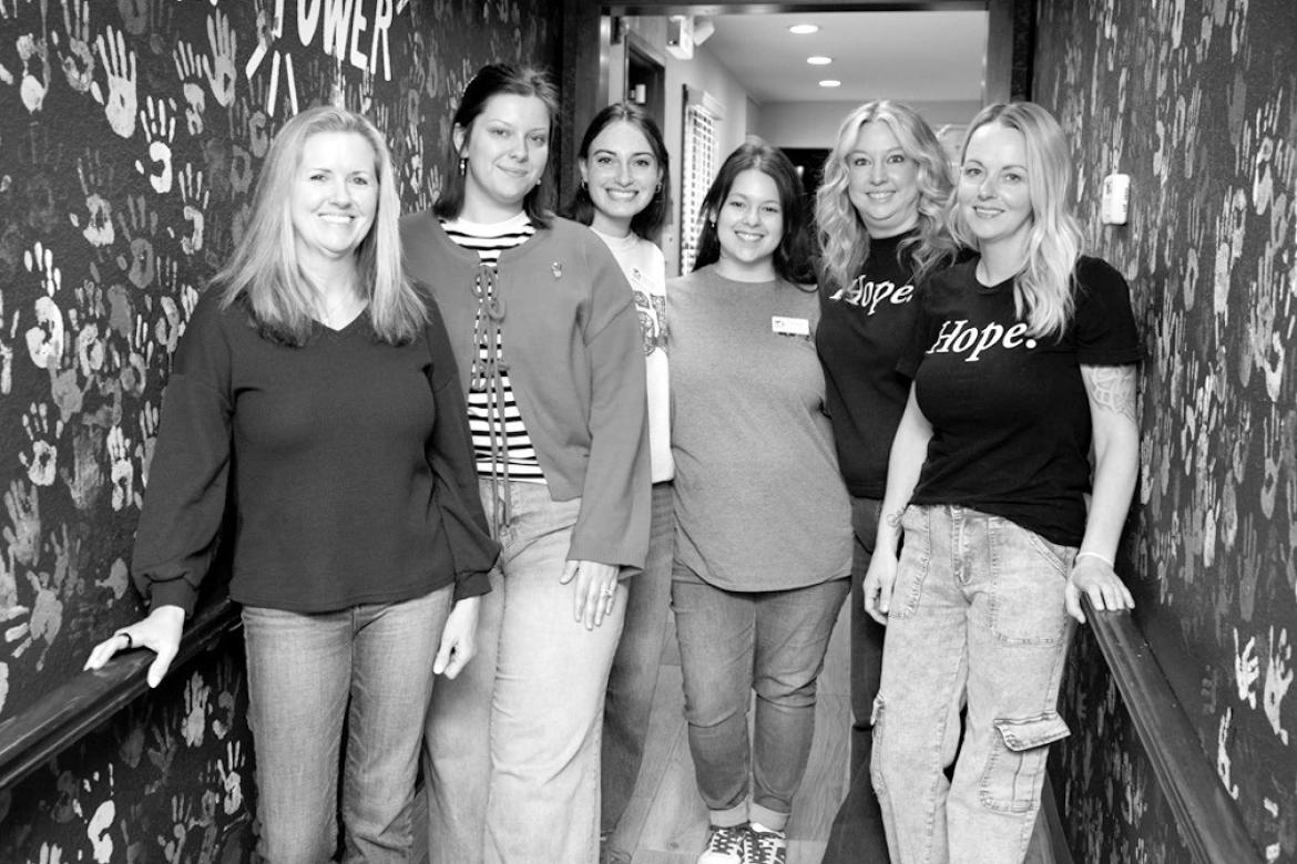 Abbott House Child Advocacy Center Executive Director Kylie Turner, far left, poses with the Abbott House staff. Pictured left to right are Bridget Lozano, Taryn Horeink, Ally Myer, Anna Adkins and Jordan Powers. (Brent Fuchs/Oklahoma Watch