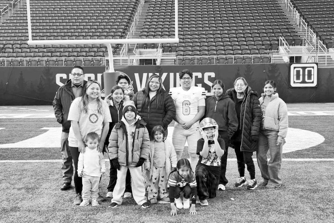 Jaime Lewis with family and friends at U.S. Bank Stadium after the Native All-American Football Game. (Photo provided)