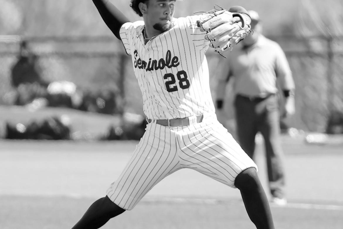 Seminole State Pitcher Jaxon Ramos delivers a pitch in a relief roll for the Trojans. Courtesy Photo by Glen Bryan