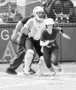 Seminole State Lady Trojan Mckayla Greenshaw heads for first base after she gets the hit. Courtesy Photo by Glen Bryan