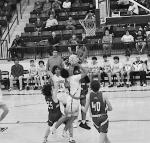Sasakwa Viking Sherman Mitchell goes in between two defenders for the basket Thursday. Staff Photo by Bill Anderson